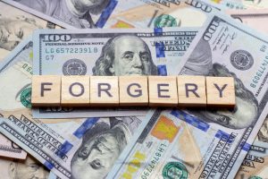 Charged with Forgery New Jersey 2C:21-1 