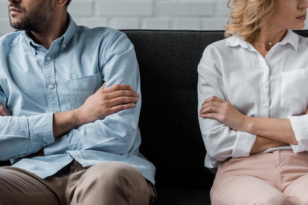 Couple sitting in a couch - Passaic County Contested Divorce Lawyer